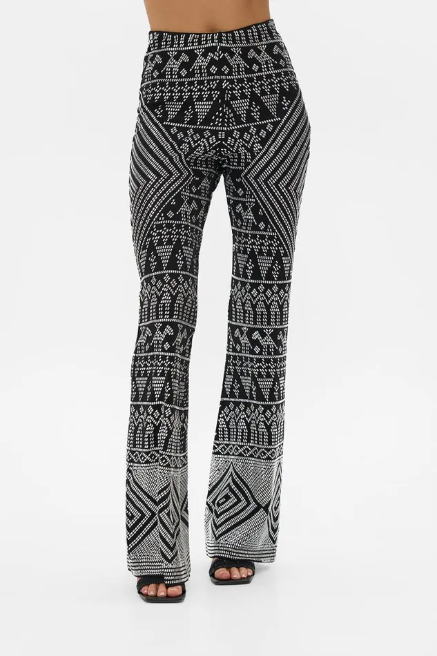 JERSEY FLARE PANT WITH ALL OVER HOTFIX THE EGYPT EFFECT The Egypt Effect Womens Camilla Pants