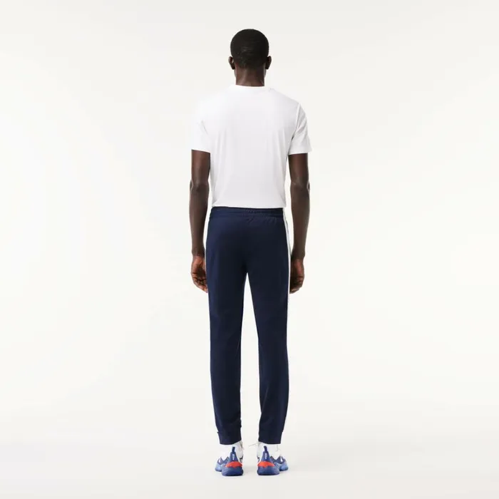 Sweatpants and Trousers Men Lacoste Men039s AbrasionResistant Tennis Sweatpants Navy Blue White 525