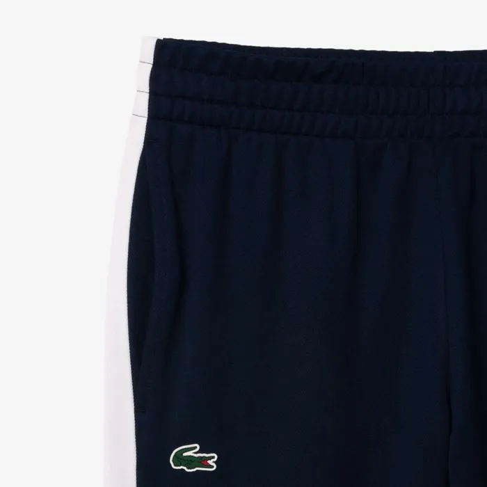 Sweatpants and Trousers Men Lacoste Men039s AbrasionResistant Tennis Sweatpants Navy Blue White 525