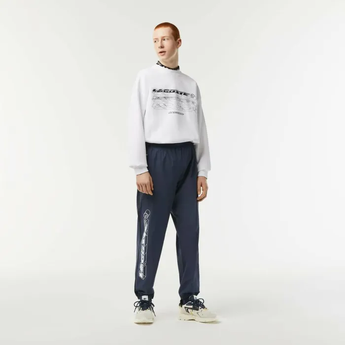 Sweatpants and Trousers Men Lacoste Mens Waterproof Stretch Joggers Blue Kxe